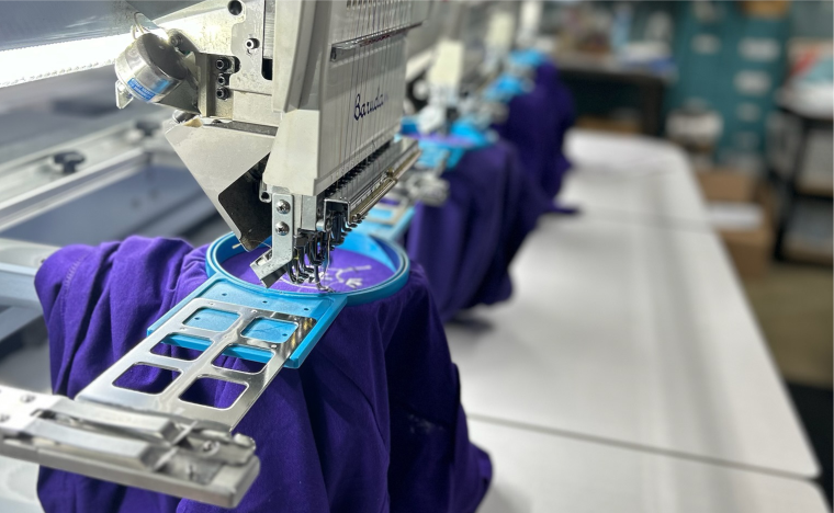 Commercial embroidery machines stitching in action