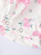 Floral Baby Girls Bow Ruffle Romper - Premium Baby & Toddler Outfits from Rylee Faith Designs - Just $26.95! Shop now at Pat's Monograms