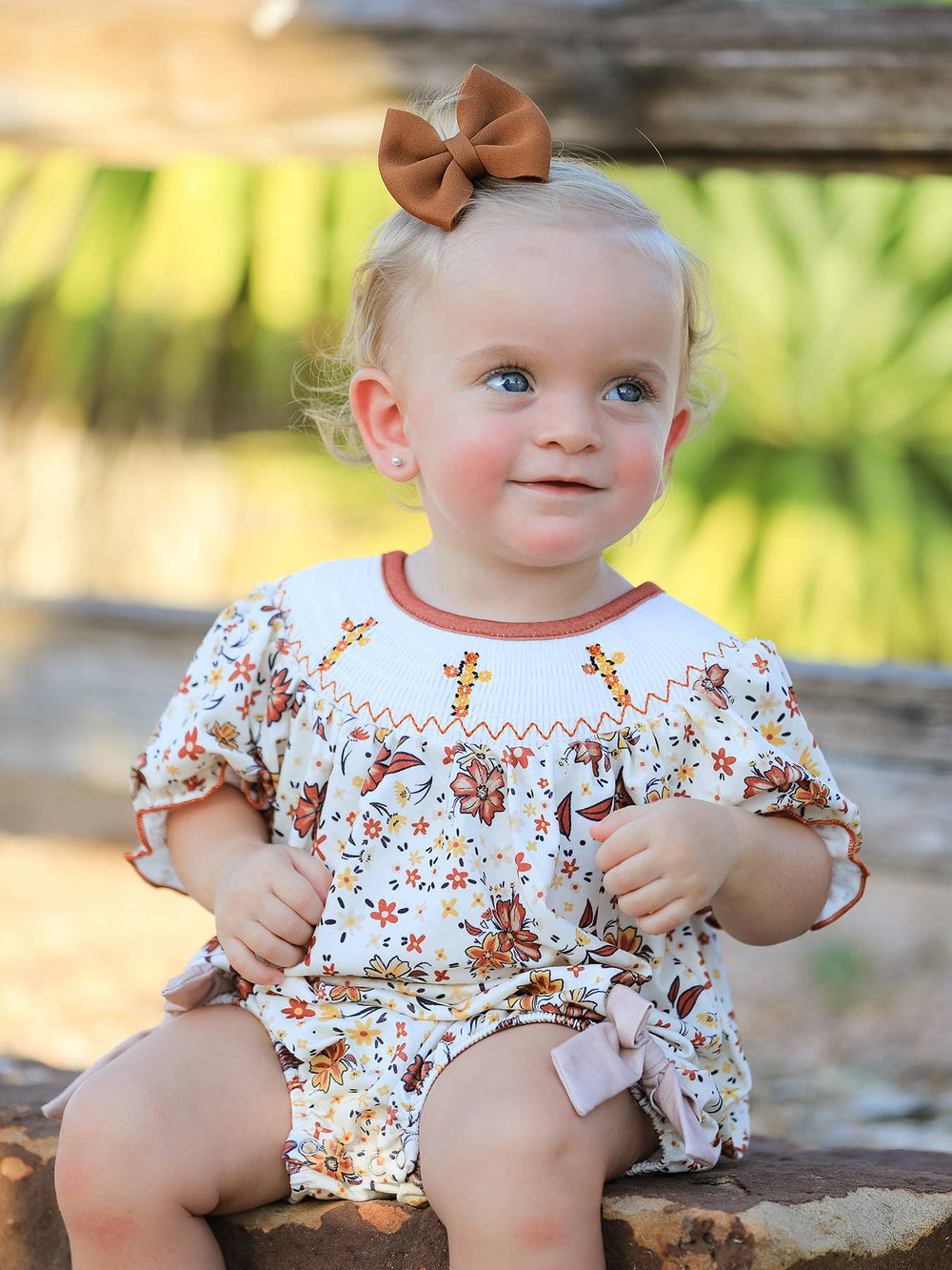 Colorful Floral Smocked Cross Baby Girl Romper - Premium  from Rylee Faith Designs - Just $24.95! Shop now at Pat's Monograms