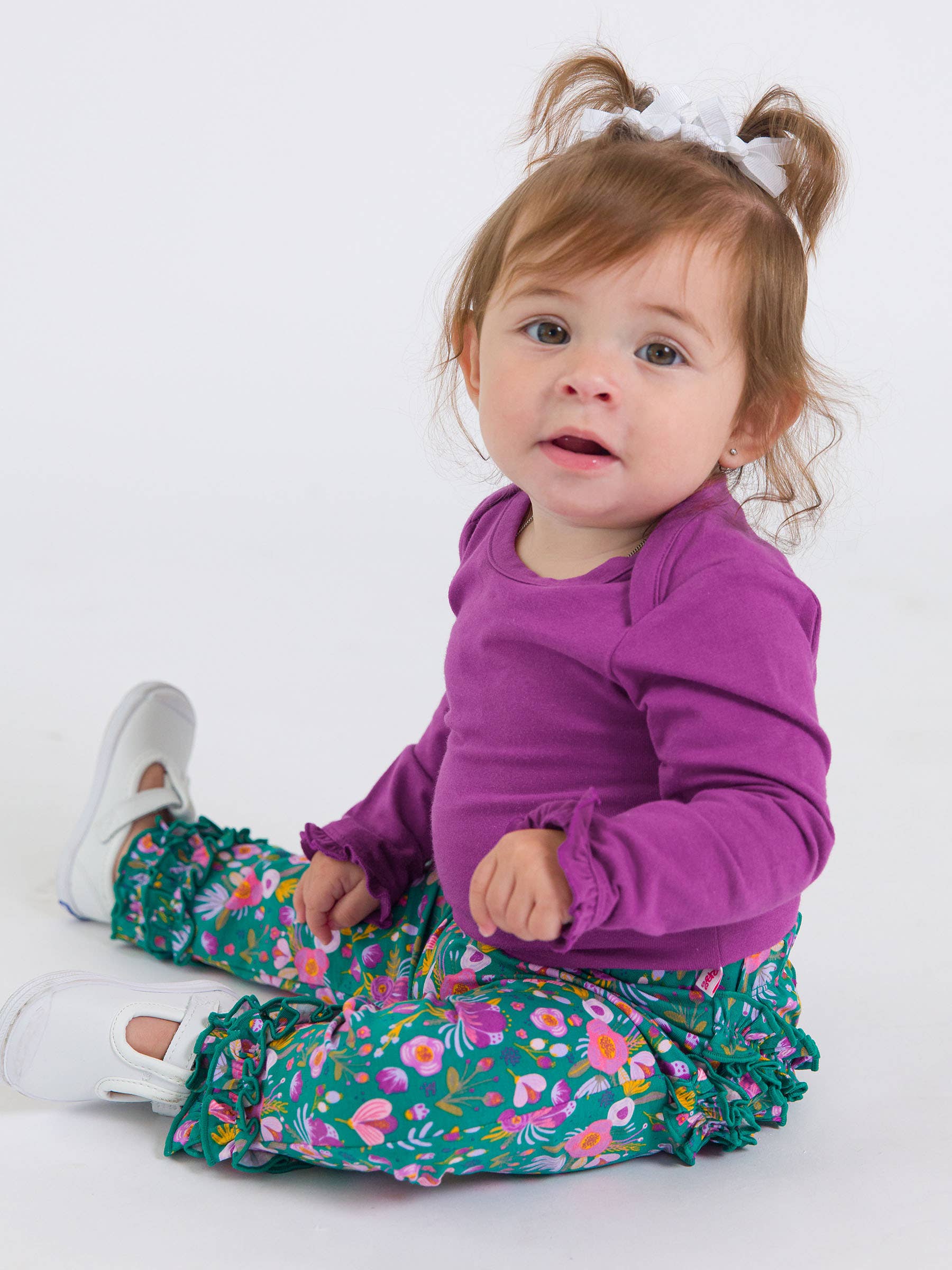 Baby Girls Plum Tart Knit Long Sleeve Ruffle Bodysuit - Premium Baby & Toddler Outfits from RuffleButts + RuggedButts - Just $24.95! Shop now at Pat's Monograms