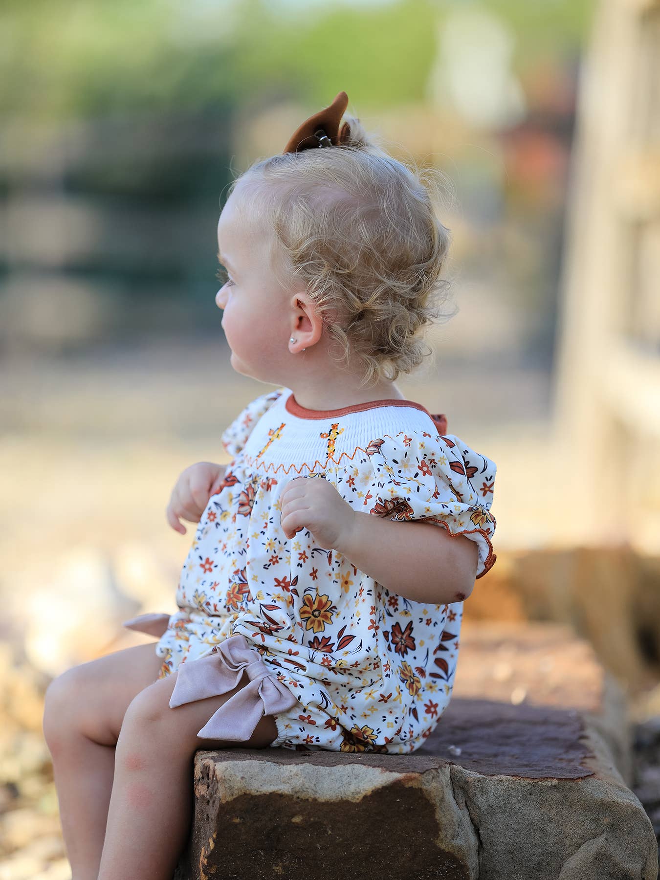 Colorful Floral Smocked Cross Baby Girl Romper - Premium  from Rylee Faith Designs - Just $24.95! Shop now at Pat's Monograms