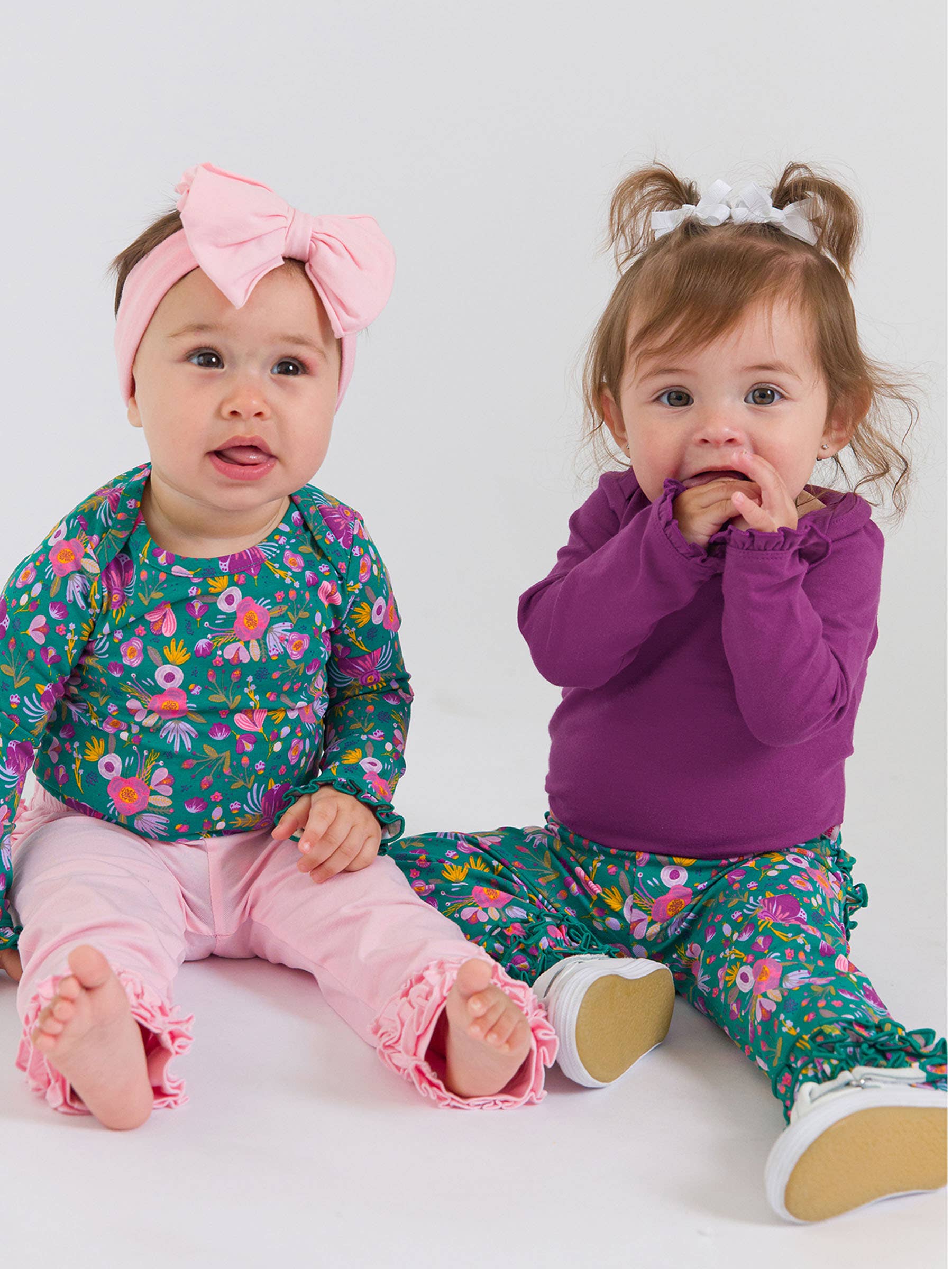 Baby Girls Plum Tart Knit Long Sleeve Ruffle Bodysuit - Premium Baby & Toddler Outfits from RuffleButts + RuggedButts - Just $24.95! Shop now at Pat's Monograms