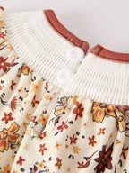 Colorful Floral Smocked Cross Baby Girl Romper - Premium  from Rylee Faith Designs - Just $24.95! Shop now at Pat's Monograms