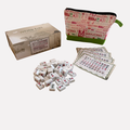 Mahjong set with tiles, packaging, and pouch on a white background