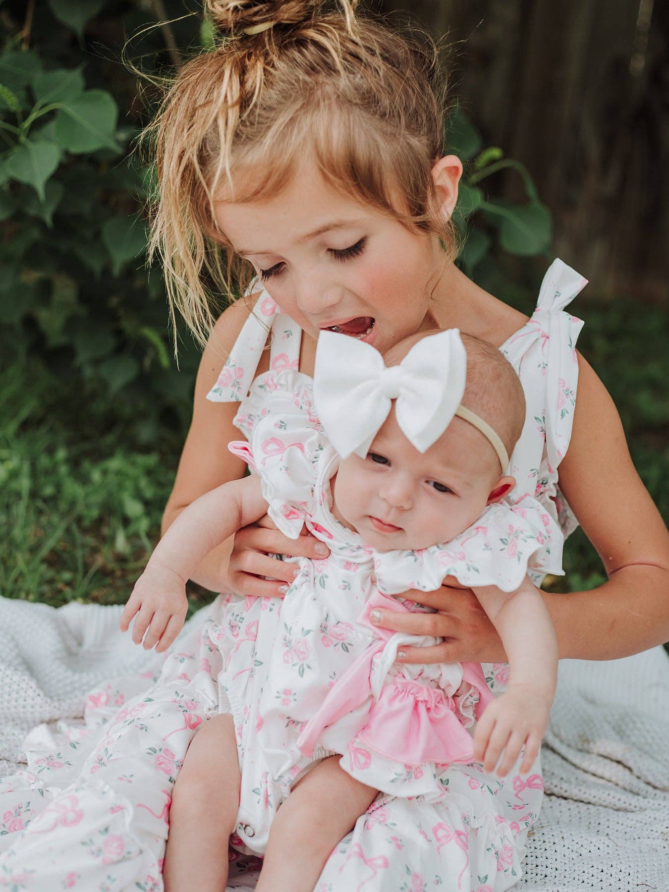 Floral Baby Girls Bow Ruffle Romper - Premium Baby & Toddler Outfits from Rylee Faith Designs - Just $26.95! Shop now at Pat's Monograms