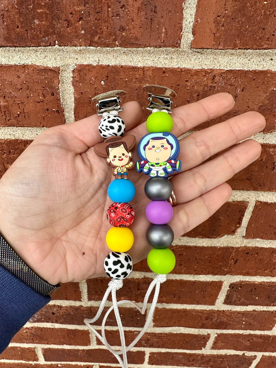 Cowboy or Spaceboy Pacifier Clip - Premium Pacifier Clip from Ridge & Co Teething Shop LLC - Just $16.95! Shop now at Pat's Monograms