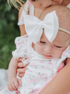 Floral Baby Girls Bow Ruffle Romper - Premium Baby & Toddler Outfits from Rylee Faith Designs - Just $26.95! Shop now at Pat's Monograms