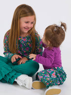 Baby Girls Plum Tart Knit Long Sleeve Ruffle Bodysuit - Premium Baby & Toddler Outfits from RuffleButts + RuggedButts - Just $24.95! Shop now at Pat's Monograms