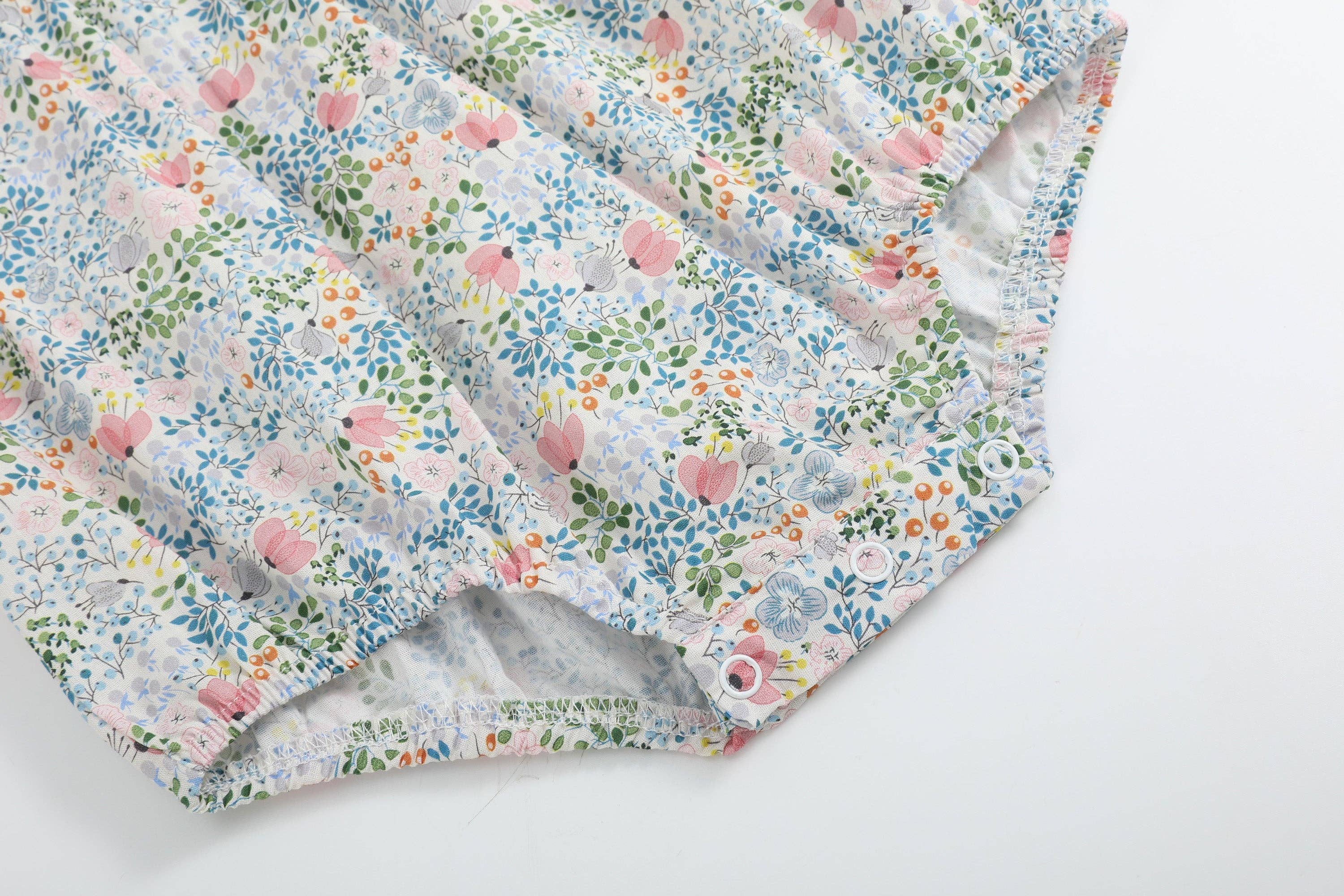 Pink Floral Print Smocked Futter Romper - Premium Baby & Toddler Outfits from Lil Cactus - Just $38.95! Shop now at Pat's Monograms